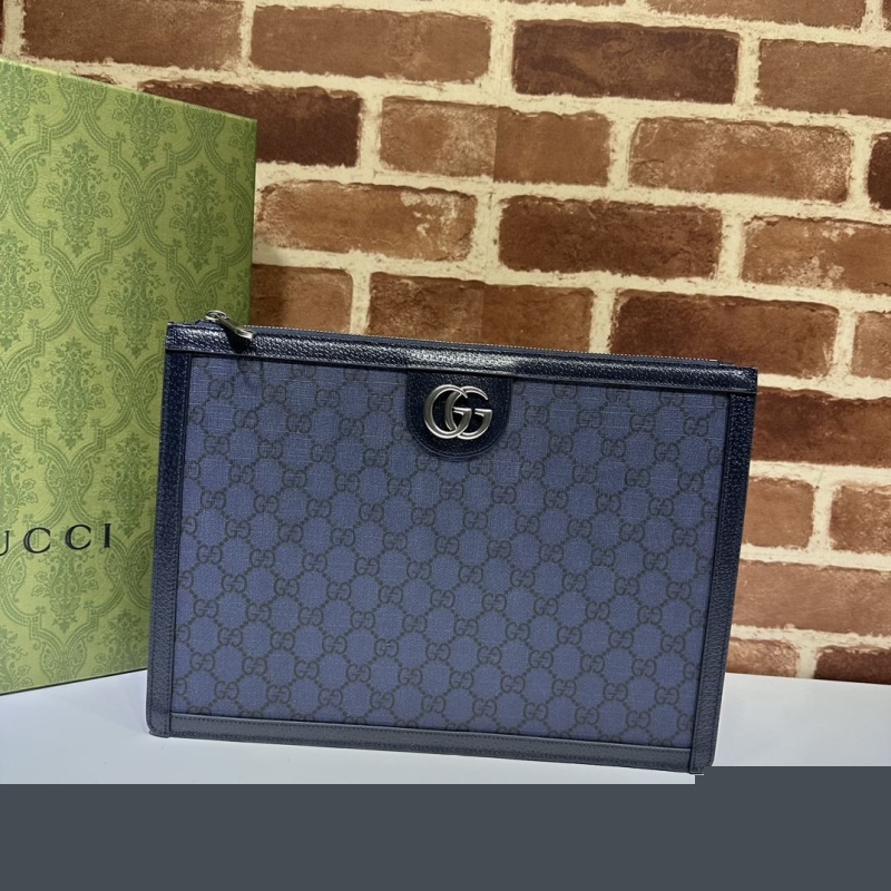 G*u*i clutch bags